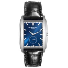 Patek Philippe Gondolo Small Seconds White Gold Blue Dial Mens Watch 5124 Papers. Manual winding movement. 18K white gold rectangular case 43 mm x 33.4 mm. Transparent exhibition sapphire crystal case back. . Scratch resistant sapphire crystal. Blue sunburst dial with raised baton hour markers. White gold dauphine hands. Small seconds sub dial at 6. Blue leather strap with Patek 18K white gold tang buckle. Blue Rectangular Business Watches, Blue Rectangular Timeless Watch, Classic Diamond Watch With Subdials, Rectangular, Timeless Blue Rectangular Watch, Classic Diamond Watch With Rectangular Dial And Subdials, Luxury Business Diamond Watch Analog, Luxury Business Diamond Watch, Analog, Rectangular Blue Quartz Watches, Luxury Analog Diamond Watch For Business