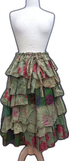 Cottagecore Long Skirt With Ruffles, Cottagecore Cotton Tiered Skirt, Cottagecore Tiered Cotton Skirt, Green Skirt For Spring Garden Party, Green Floral Patchwork Skirt For Summer, Green Skirt For Garden Party, Green Cotton Skirt For Spring, Flowy Green Cotton Skirt, Green Cotton Tiered Skirt