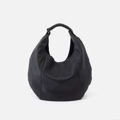 Meet Eclipse Medium. Just like the iconic hobo shape bag you know and love, now in a smaller size that will fit perfectly on your shoulder and under your arm. Inside you’ll find an attached zip pouch in contrasting leather for extra organization! Crafted in our Velvet Pebbled Hide, our softest and most casual leather that only gets more beautiful over time. Old English Brass Hardware Hidden Magnet Closure Interior Front: Slip pocket; Interior Back: Slip pocket Fits your smartphone and most table Black Hobo Bag, Fancy Bags, Love Now, Long Term Relationship, Zip Pouch, Black Media, Hobo Bag, Rebecca Minkoff Hobo, Pebbled Leather