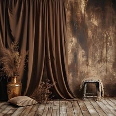 a room with a wooden floor and drapes on the curtained wall, next to a small stool