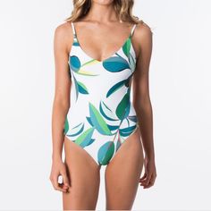 Rip Curl Palm Bay Good One Piece Swimsuit In Size Small Printed White Bodysuit For Vacation, White Printed Bodysuit For Vacation, Tropical White One-piece Swimwear, White Floral Print Bodysuit For Poolside, Tropical White Bodysuit For Pool, Tropical White Bodysuit For The Pool, White Tropical Bodysuit For Summer, Tropical White Sleeveless Bodysuit, White Printed Summer Bodysuit