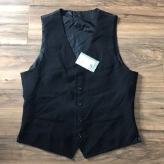 Size 40r. New With Tag. Black Vest. Event. Formal Black Formal Vest For Spring, Classic Black Vest For Business, Tailored Black Vest For Spring, Casual Tailored Black Vest, Formal Black Vest With Pockets, Black Formal Vest For Fall, Black Workwear Vest With Pockets, Classic Black Vest With Pockets, H&m Black Workwear Outerwear