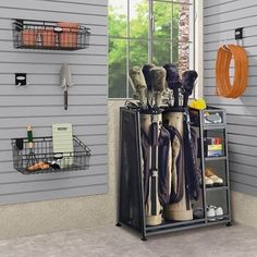 there is a rack with many different items on it in front of the window,