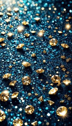 gold diamonds are scattered on a dark blue background with sparkles in the foreground