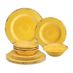 yellow dinnerware with speckles on it