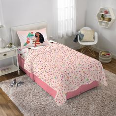 a child's bedroom with a pink bed and white walls