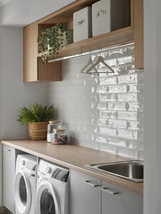 a washer and dryer in a small room