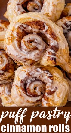 cinnamon rolls are piled on top of each other with the words puff pastry cinnamon rolls