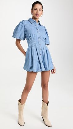 The Jonathan Simkhai Ciara Denim Shirting Dress features the feminine flare you love from this designer. This denim shirtdress features a pintuck waistband with ballooned sleeves and waistband. Wear yours with flats and a crossbody bag. Denim dress Button front Pintuck waistband Balloon sleeves and hemline Mini length Organic cotton/recycled stretch blend Danielle Guizio, Cocktail Wear, Standard Dress, Denim Shirt Dress, Jonathan Simkhai, Unique Dresses, Shirtdress, Balloon Sleeves, Denim Shop