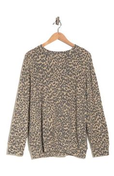 Have a (slightly) wilder weekend in this cozy crewneck marked with a trend-right animal print. 28" length Crewneck Long sleeves 68% polyester, 28% rayon, 4% spandex Machine wash, dry flat Imported Women's Clothing Leopard Print Crew Neck Top For Winter, Leopard Print Relaxed Fit Top For Fall, Leopard Print Top With Relaxed Fit For Fall, Leopard Print Tops With Relaxed Fit For Fall, Camel, Leopard Print, Top Brands, Animal Print, Women's Clothing