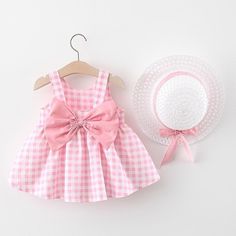 ADORABLE plaid baby girls dresses with cute bow and hat details.Color options: Pink, Yellow and Red is available.Available sizes for baby girls up to 36 months old.Package includes: 1 dress + 1 hat Material: CottonDresses Length: Knee-LengthSilhouette: Ball GownFit: Fits true to size, take your normal size Baby Suspenders, Plaid Baby, Plaid Outfits, Girls Dresses Summer, Baby Dresses, Baby Outfits Newborn, Dress Hats, Toddler Girl Outfits