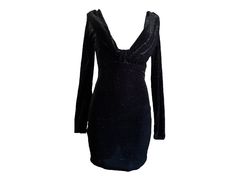 "Vintage 90s mini dress in black velvet with silver metallic glitter through out. Long sleeves with a plunging low V neckline. Stretchy bodycon fit.  Condition: Very good vintage Best fits women's: Small Material: Polyester Lycra  MEASUREMENTS Taken from seam to seam while the garment is lying flat. Double the armpit, waist, and hips Length from Top: 31\" Armpit to Armpit: 19 to 22\" stretches to  Waist: 14 to 17\" Hips: 17 to 21\" Sleeve 25\"" Glamorous Mini Velvet Dress For Night Out, Glitter V-neck Mini Dress For Cocktail, Glamorous Velvet Dress For Party Season And Night Out, Glamorous Mini Velvet Party Dress, Glamorous Holiday Velvet Party Dress, Fitted Velvet Mini Dress With Sequins, Holiday Velvet Mini Dress For Party, Glamorous Velvet Dress For Winter Night Out, Glamorous Winter Velvet Dress For Night Out