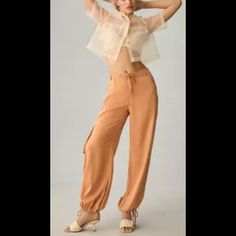 Anthropologie On The Road Drawstring Ankle Cargo Pants Size Xl Nwt Front Slant Pockets, Side Cargo Pockets, Zip Front, Machine Wash, Tencel Medium Orange On The Road, Color Orange, Cargo Pants, The Road, Pant Jumpsuit, Anthropologie, Pants For Women, Road, Orange