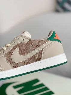 Embrace the ultimate fusion of streetwear and luxury with these Air Jordan 1 Low-inspired sneakers, customized with Gucci flair. The earthy brown and sail colorway, reminiscent of the coveted Travis Scott collaboration, is elevated with the iconic Gucci monogram subtly incorporated into the design. The reversed Swoosh and green accents add a playful touch, while the premium materials and meticulous craftsmanship ensure a comfortable and stylish experience. Step out in a pair that's truly one-of- Luxury Cream Sneakers For Streetwear, Designer Beige Sneakers With Contrast Sole, Modern Beige Sneakers For Streetwear, Luxury Brown Sneakers For Streetwear, Luxury Lace-up Custom Sneakers For Streetwear, Beige Custom Sneakers With Laces For Streetwear, Luxury Brown Custom Sneakers For Streetwear, Modern Brown High-top Sneakers For Streetwear, Luxury Custom Sneakers With Laces For Streetwear