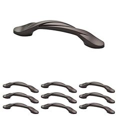 a set of six black handles for a kitchen cabinet