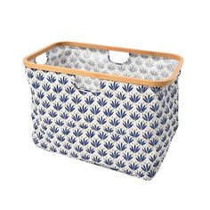 a large blue and white storage basket with wooden handles on an isolated white background, designed to look like leaves