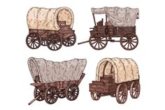 three old covered wagons on wheels