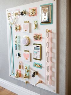 a wall mounted with magnets, keys and other things on it's side