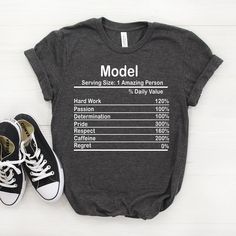 "Personalized Model Nutrition Facts Shirt, Model Shirt, Model Gift, Model T shirt, Model Tshirt, Model Tee, Model T-shirt ♥ This is a great personalized Model gift that will put a big smile on the recipient's face. Gift them an unforgettable memory now! 𝐒𝐈𝐙𝐈𝐍𝐆 𝗔𝗡𝗗 𝐂𝐎𝐋𝐎𝐑𝐒 For detailed sizing information and color options, please see listing images. -B.C Only - It means that we have that color only for our Bella Canvas Tees. 📌 𝗛𝗢𝗪 𝗧𝗢 𝗢𝗥𝗗𝗘𝗥 𝟏. Select the shirt \"𝗦𝘁𝘆𝗹? Boss T Shirt, Bella Canvas Tees, Drummers, Smile On, Lacrosse, Unisex Shirts, Scuba Diving, Tee Design, Lawyer