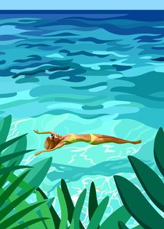 a woman swimming in the ocean surrounded by plants