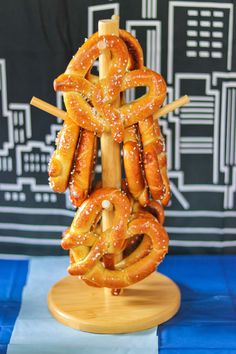 some pretzels are on a wooden stand