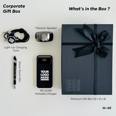 the contents of a corporate gift box laid out on top of each other and labeled with information