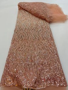 This high quality Fabric is measured in 5 Yards With Embroidered Beading and Sequin. It is soft, very delicate and beautiful. This high Quality Fabric is made with Fashion embroidered rhinestones can be used in making party wedding dresses, skirts, shawls, scarves and other other fashion apparels as you would like. Size : Length : 5 yards (180 inch). Width: 50 inch (Please allow slight deviation for the measurement data ,±1 inch) Material: 100% Polyester, Tulle Lace Fabric, Eco-Friendly embroide Elegant Sparkling Tulle Fabric For Party, Elegant Bedazzled Sequin Fabric For Party, Glamorous Fitted Embroidered Fabric For Wedding, Elegant Fitted Tulle Fabric With Pearl Embroidery, Elegant Sparkling Tulle Fabric For Evening, Elegant Party Sequin Fabric, Elegant Fitted Gold Tulle Fabric, Elegant Embroidered Fabric With Rhinestones For Party, Elegant Tulle Fabric With Pearl Embroidery For Party