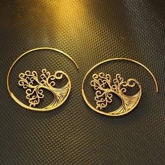 WickedAF Gold Tree Of Life Spiral Hoop Earrings Bohemian Gold Spiral Wrap Earrings, Spiral-shaped Pierced Metal Jewelry, Pierced Swirl Jewelry Gift, Swirl Shaped Pierced Jewelry Gift, Bohemian Gold Swirl Jewelry, Spiral Earrings For Festivals, Festival Spiral Gold Earrings, Unique Spiral Metal Hoop Earrings, Artistic Gold Spiral Jewelry