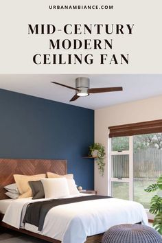 a bedroom with blue walls and white bedding in the center is a ceiling fan