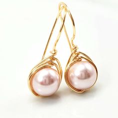 Beautiful and delicate pearls women's earrings, they are a perfect gift of jewelry for wedding or bridesmaid and personal use, they are hand-crafted with selective pieces of precious stones and gold fill wire. a charming minimalist detail and as daily use it looks good with everything outfit since beige is a neutral color. For these beautiful earrings you can choose to make us in any of our wrapped wire: rose gold, silver or gold the one you like best Receive these earrings in a box ready to giv Adjustable Pearl Charm Earrings As Gift, Elegant Hoop Earrings For Mother's Day, Gift Pearl Earrings With Ear Wire, Elegant Dangle Hoop Earrings For Mother's Day, Elegant Adjustable Earrings For Mother's Day, Pearl Teardrop Hoop Earrings For Gift, Pearl Teardrop Hoop Earrings As Gift, Teardrop Pearl Hoop Earrings For Gifts, Nickel Free Pearl Earrings For Anniversary