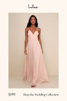 a woman in a long pink dress with the words shop the wedding collection