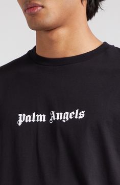 The Milanese label's gothic logo stands out against the black backdrop of this slim-fit T-shirt made from soft, breathable cotton. 27" length (size Medium) Crewneck Short sleeves 100% cotton Machine wash, dry flat Made in Italy Designer Clothing Boys Fits, Black Backdrops, Palm Angels, Classic Logo, Graphic Tshirt, Short Sleeves, Nordstrom, Slim Fit, Black And White