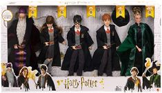 the harry potter dolls are posed in their costumes