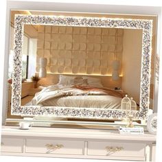 a bedroom with a large mirror on the wall