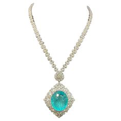 The Following Items we are offering is a Rare Important Gorgeous 18KT White Gold Glittering Diamond and Paraiba Tourmaline Necklace!!!! Necklace features Outstanding Multi Shaped Shimmering Gorgeous Extremely Rare Fancy Oval Cut Large Paraiba Tourmaline and adorned with Fancy Glittering Marquise, Pear and Round Cut Full Cut Diamonds!!! T.C.W. Approx 45CTS!!! NWT Original Retail $525,000. Comes with a Certified Gemological Certificate. A Rare Spectacular Masterpiece!!! Paraiba Tourmaline Necklace, Expensive Necklaces, Teal Jewelry, Princesa Real, Diamond Pendants Designs, Paraiba Tourmaline, Gem Necklace, Tourmaline Necklace, Fancy Diamonds