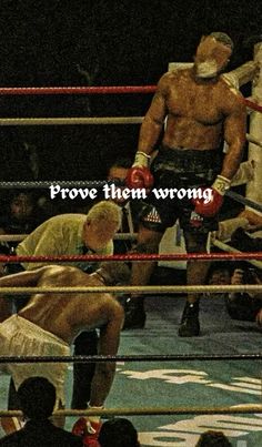 two men standing next to each other in a boxing ring with the words prove them wrong