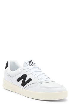 A lowkey sneaker with New Balance logo detailing provides old school charm that complements off-duty ensembles. Leather upper/synthetic lining/rubber sole Imported Classic Lace-up Sneakers With Logo Print, New Balance Sneakers With Logo Patch For Sports, New Balance Lace-up Sneakers With Logo, New Balance Leather Sneakers With Logo Patch, New Balance Low-top Sneakers With Logo, Classic Sneakers With Logo And Round Toe, Classic Low-top Sneakers With Logo Patch, Classic Sneakers With Logo, Classic New Balance Lace-up Skate Shoes