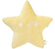 a yellow star shaped pillow with eyes and nose