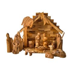 a wooden nativity scene with figurines in it