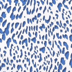 a blue and white leopard print fabric with an animal pattern on the back of it