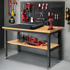 a workbench with various tools on it