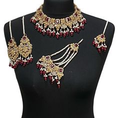 bridal jewellery set. Set includes- Necklace Earrings  Jhumar  Tikka Bollywood Style Necklace With Latkans For Wedding, Bollywood Necklaces With Latkans For Wedding, Bollywood Style Necklaces With Latkans For Wedding, Bollywood Style Wedding Necklaces With Latkans, Bollywood Kundan Bridal Accessories For Marriage, Bollywood Chandbali Bridal Necklace For Marriage, Bollywood Style Chandbali Bridal Necklace For Marriage, Temple Jewelry Sets With Latkans For Wedding, Bollywood Style Jewelry With Latkans For Wedding