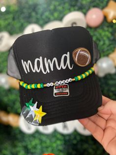 Friday Night Lights hair? Don't care!  Every football mom needs one of our custom trucker hats to wear on Friday nights. I also have different colored footballs, baseballs, soccer balls, hockey sticks, volleyballs and basketballs!   All our hats are totally customizable, so message us to request custom colors or patches. We can build a custom listing just for you! Customized Black Adjustable Hat, Adjustable Customizable Sports Fan Hat, Customizable Black Trucker Baseball Cap, Customizable Black Trucker Hat For Gift, Adjustable Trucker Hat For Game Day, Customizable Black Snapback Hat For Sports, Customizable Black Snapback Hat For Sports Events, Customizable Black Adjustable Baseball Cap, Customizable Adjustable Snapback Hat For Sports