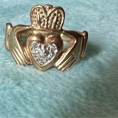 Beautiful 14kt Yellow Gold And Diamond Claddagh Ring Sz 7 Heart-shaped Yellow Gold Jewelry With Center Stone, Heart Shaped Yellow Gold Jewelry With Center Stone, Antique Yellow Gold Heart Cut Jewelry, Collectible Gold Rings With Diamond Accents, Antique Gold Jewelry With Center Stone, Collectible 14k Gold Hallmarked Diamond Ring, Collectible Hallmarked 14k Gold Diamond Ring, Collectible 14k Gold Heart-shaped Jewelry, Gold Heart Cut Collectible Jewelry