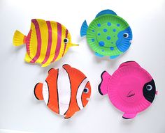 an image of three colorful fish on the web page for pinterest today com