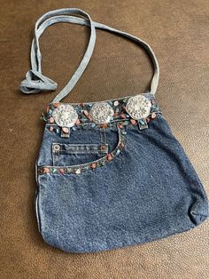 This denim crossbody bag has some loose beads and minor wear but still in good condition. Please review all photos and measurements carefully before purchasing . Feel free to ask questions. All sales are final. Thank you! Denim Crossbody Bag, Denim Bag Patterns, Hand Heart, Denim Crossbody, Denim Purse, Handbag Pattern, Heart Hands, Denim Bag, Pocket Book