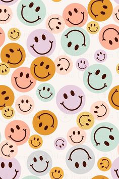 many different colored smiley faces on a white background with brown, pink, and blue circles