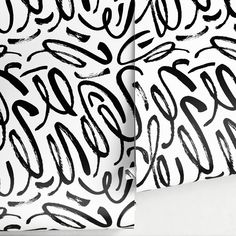 black and white wallpaper with different types of graffiti on it's sides, including letters