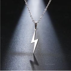 Nice Little Polished Stainless Steel Lighting Bolt Necklace, Hypoallergenic Safe For All Skin Types 17" Chain Pendant 1" In Height Stainless New In Package Thunder Lighting Pendant Jewelry Gift Idea For Her Lightning Pendant, قلادات متدلية, Lightning Bolt Necklace, Goth Necklace, Necklace Chain Types, 20 Inch Necklace, Lovers Necklace, Gold Link Chain, Couple Necklaces