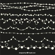 a set of christmas lights and garlands in white on black background, with space for text